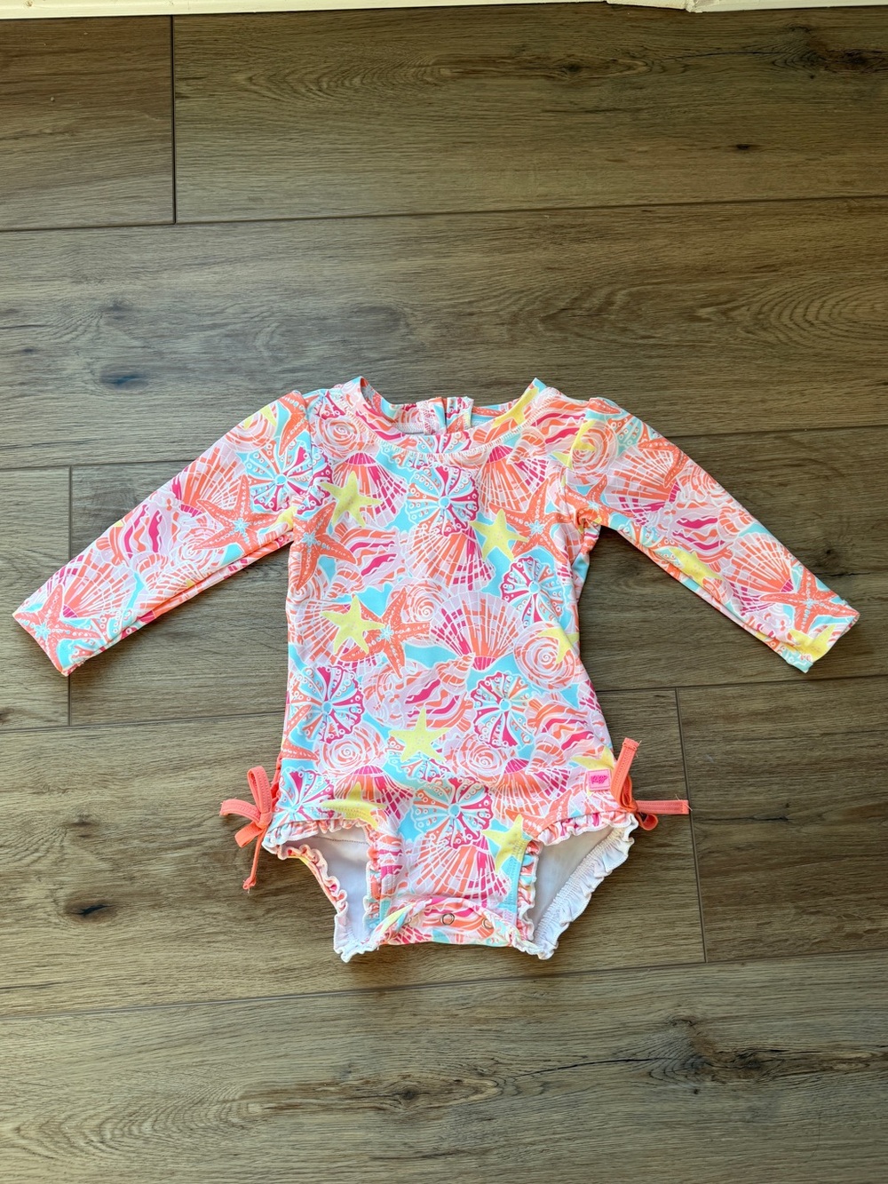 Rufflebutts Baby Girls' Long Sleeve Onesie Rash Guard 12-18 months
